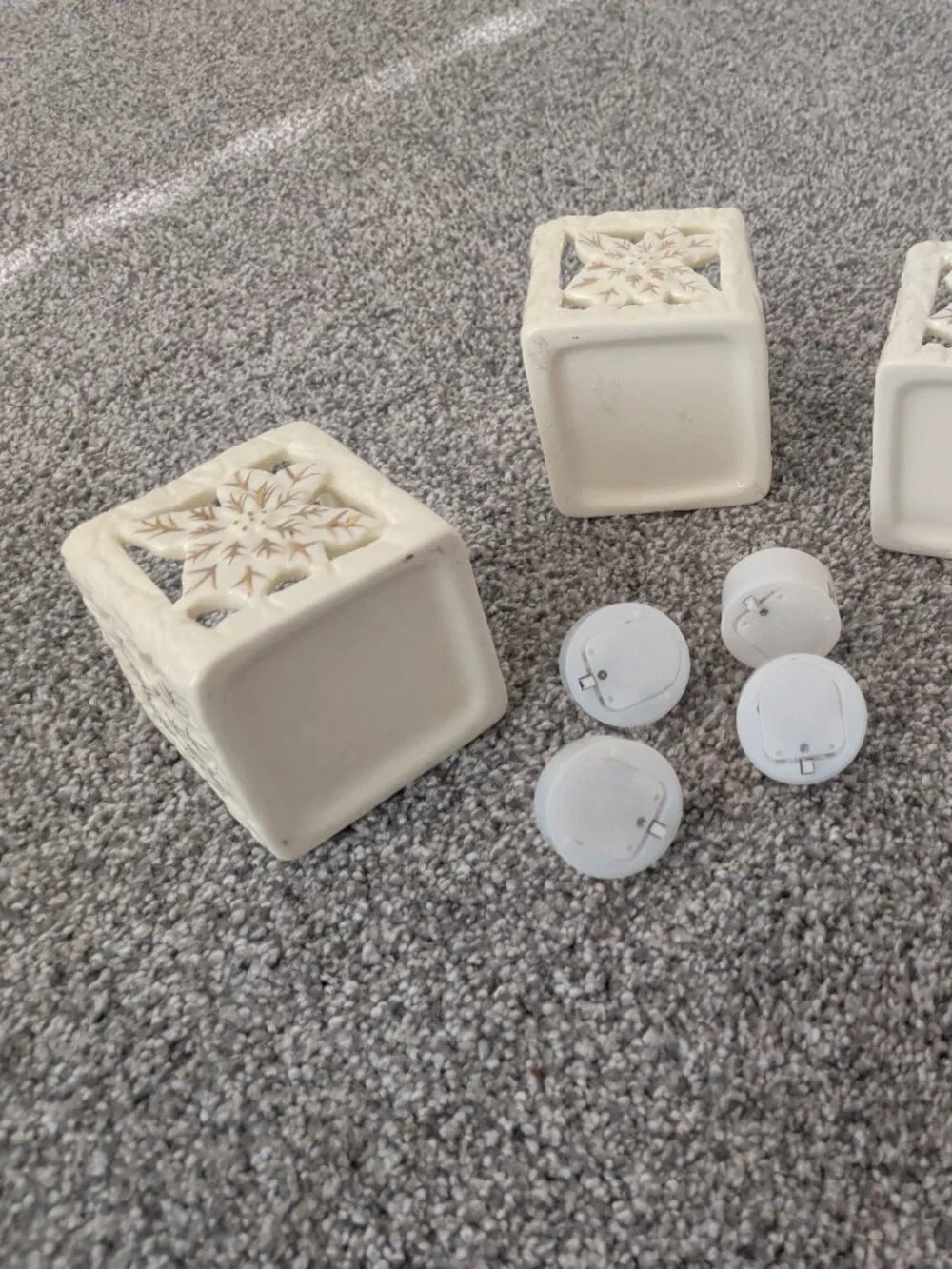 Set of 4 Cream Ceramic Pierced Poinsettia Tea Light Lanterns + 4 LED Candles